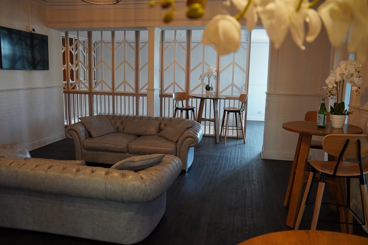 oconnel with couches.JPG